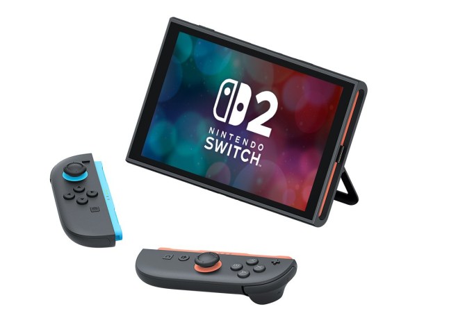 Nintendo Switch 2 in desktop mode standing along side two Joy-Con 2 controllers