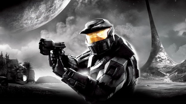 Halo Master Chief pointing a pistol while standing in front of a grayscale planet surface