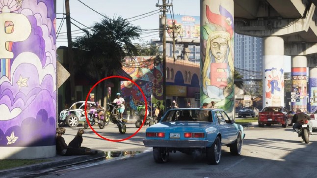 GTA 6 city street filled with pedestrians and a man popping a wheelie on his motorbike